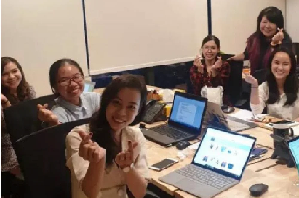 Innovative Hub Vietnam team celebrating the office opening, 2019