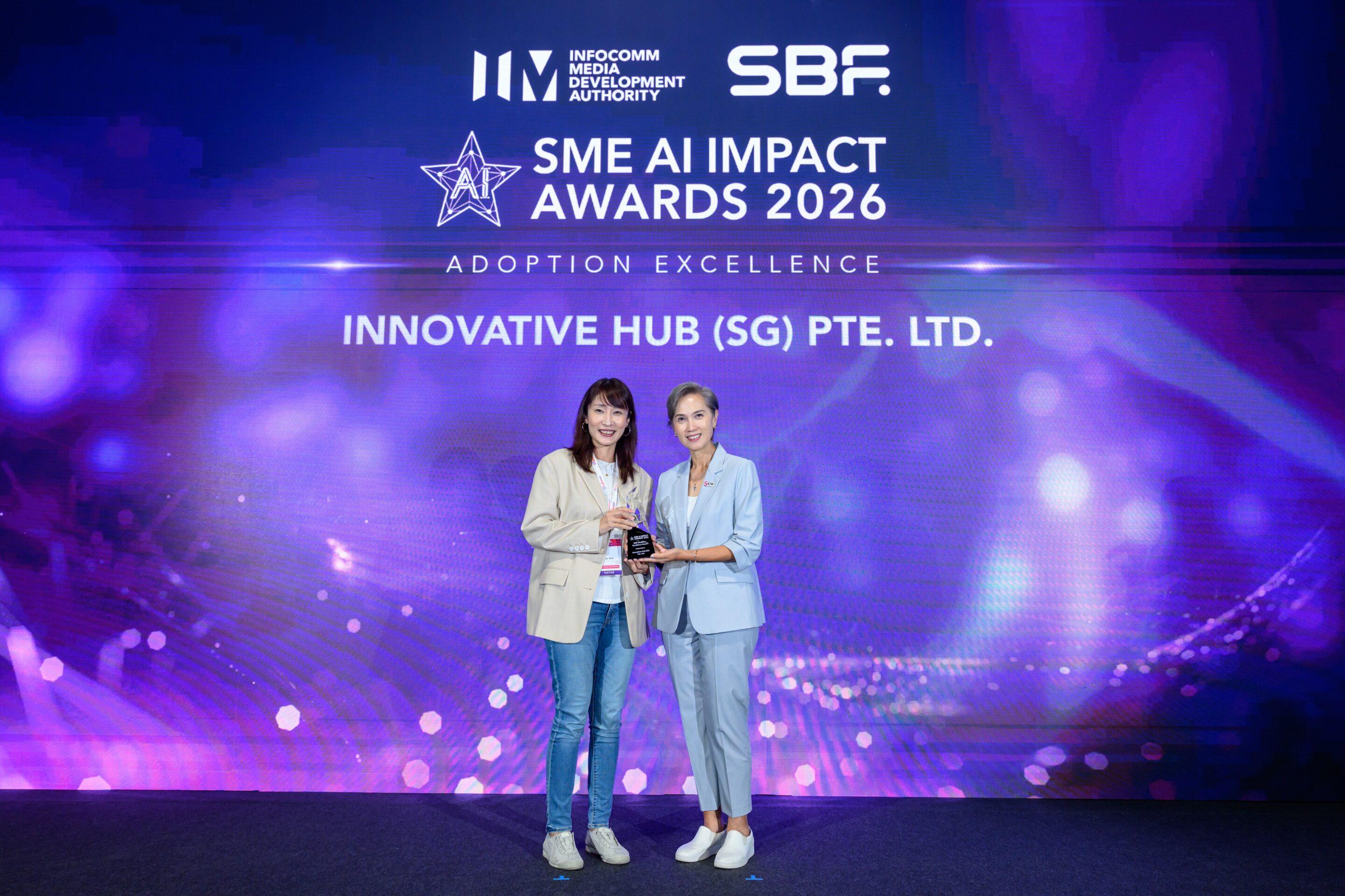 Zoe Zuo of Innovative Hub receiving the SME Adoption Excellence Award from Minister Josephine Teo at the SME AI Impact Awards 2026